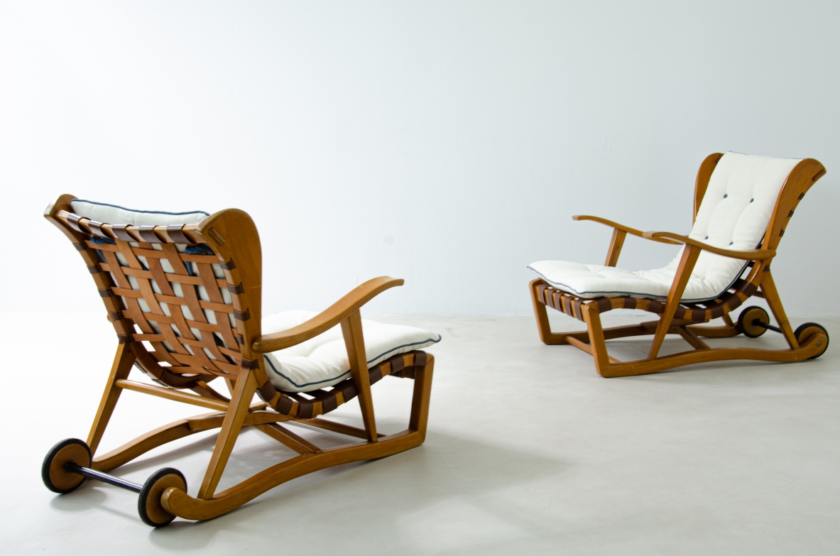 Guglielmo Pecorini. Rare pair of armchairs with rear wheels, coming from the Giulio Cesare ocean liner.