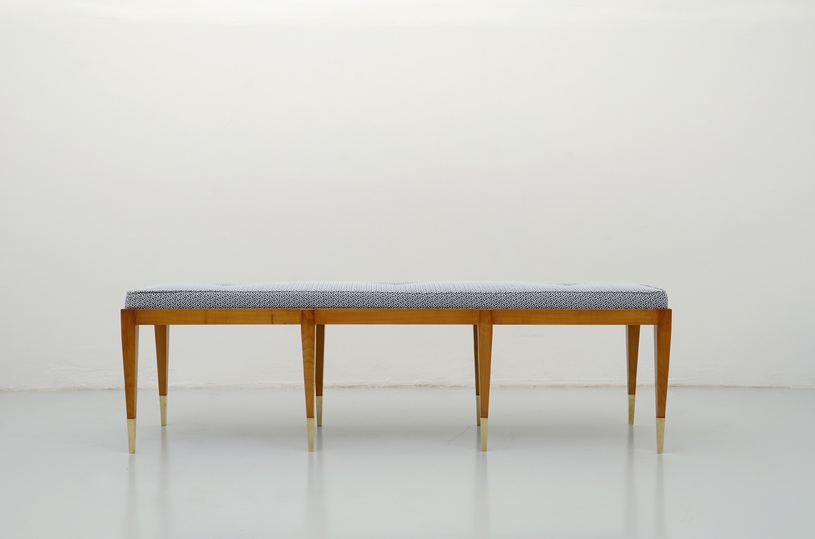 Elegant bench in cherry wood with nice and thin brass tips. Manufactured by Officina Antiquaria