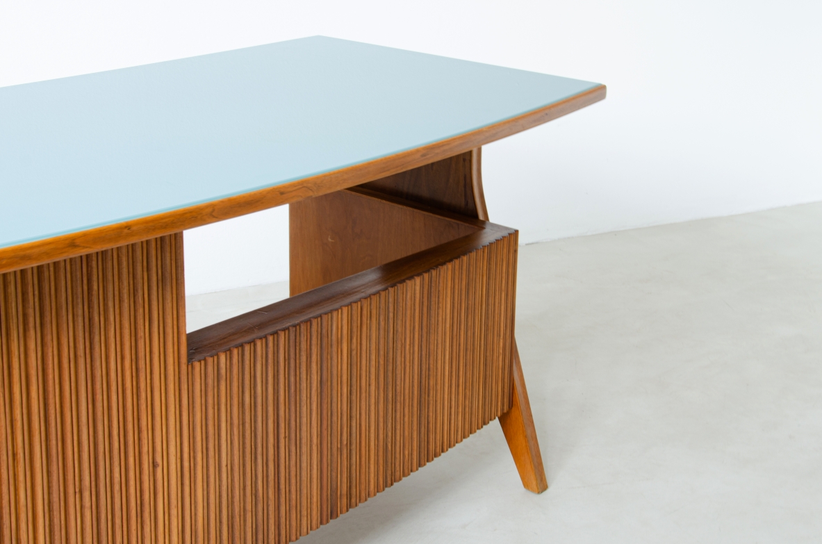 Oak desk with ribbed wood structure and green opaline glass top. Turin school, Italy, 1950's