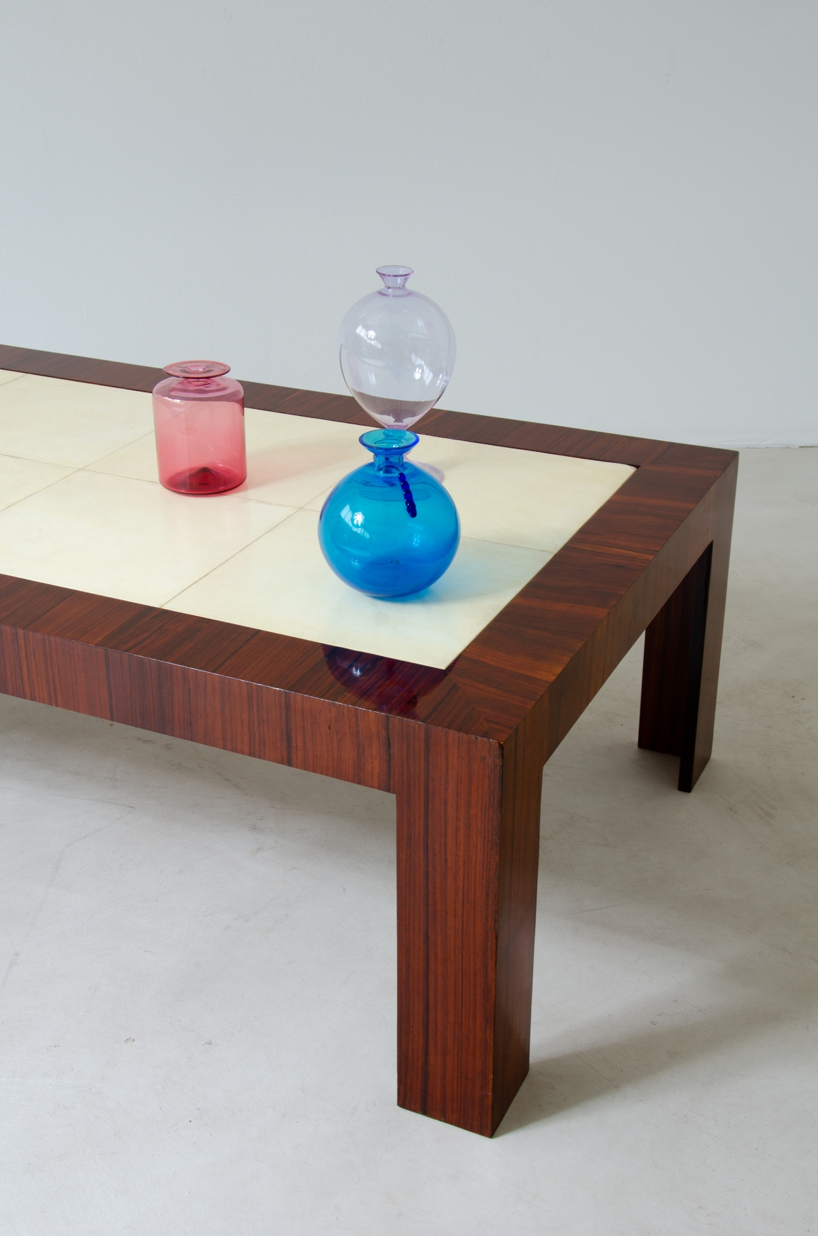 Very elegant Art Deco low table in rosewood with goat skin top.  France 1930's.