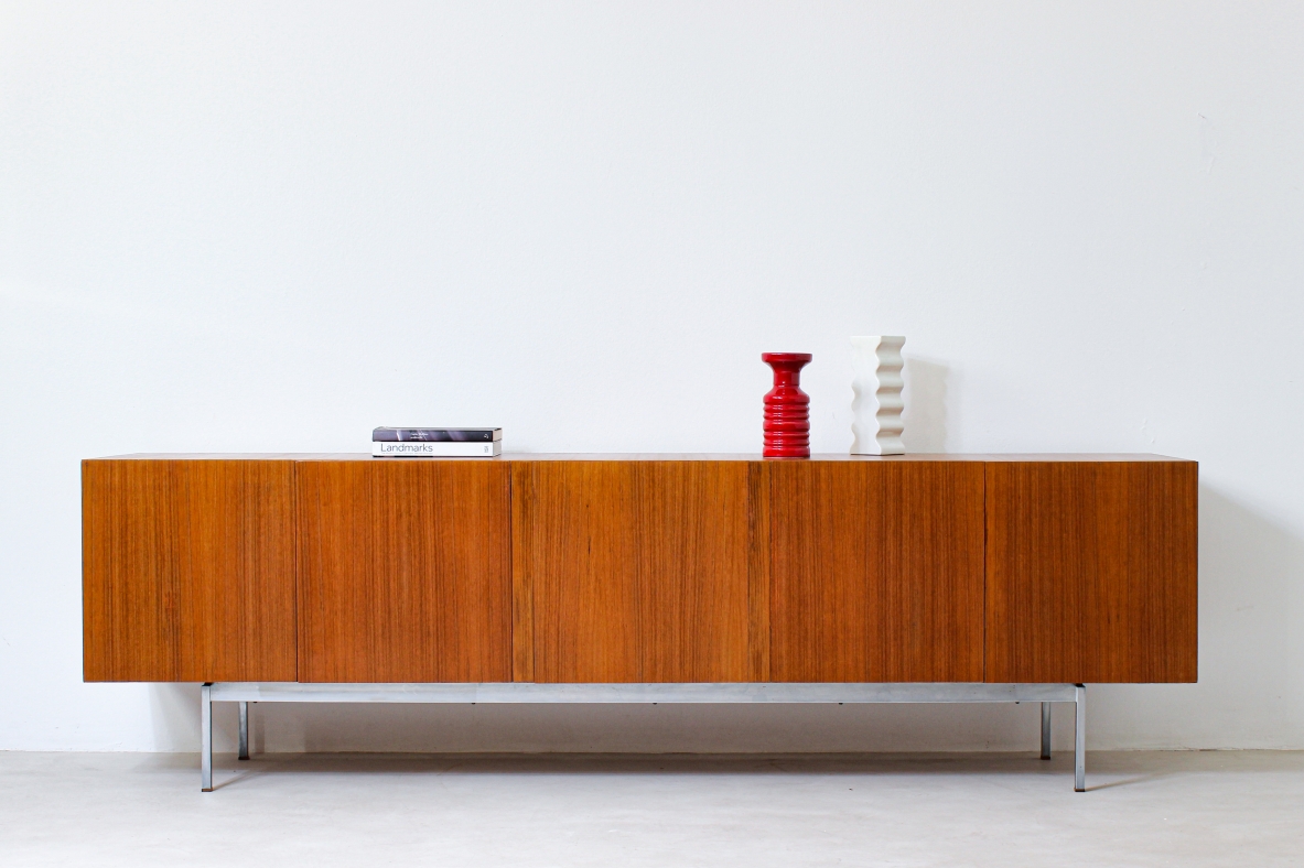 Container unit in blond wood with steel base. Italian manufacture, 1960's.