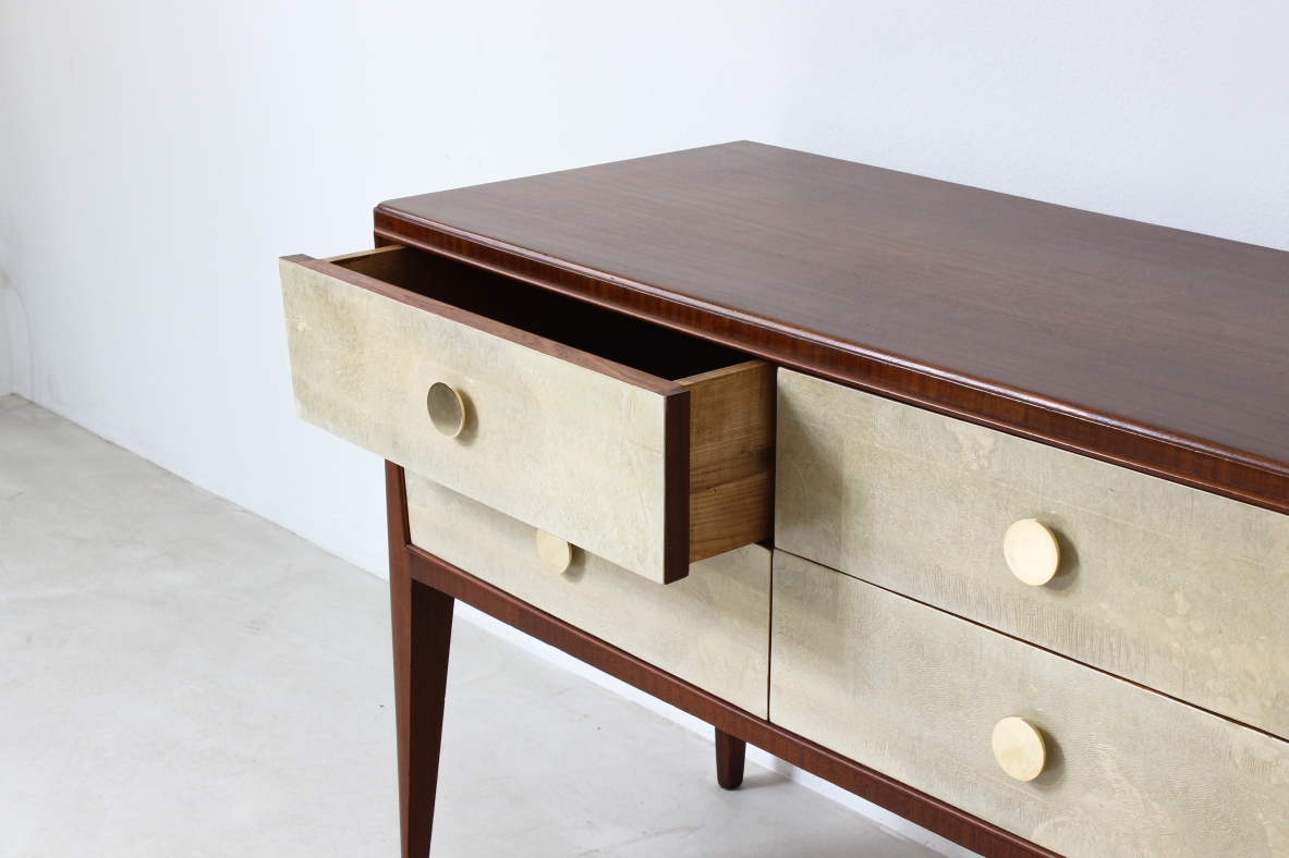 Chest of drawers in walnut with nice long and thin legs and brass handles.  Attributed to Paolo Buffa, 1950's.