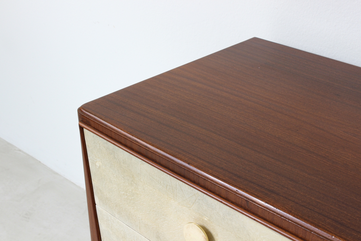 Chest of drawers in walnut with nice long and thin legs and brass handles.  Attributed to Paolo Buffa, 1950's.