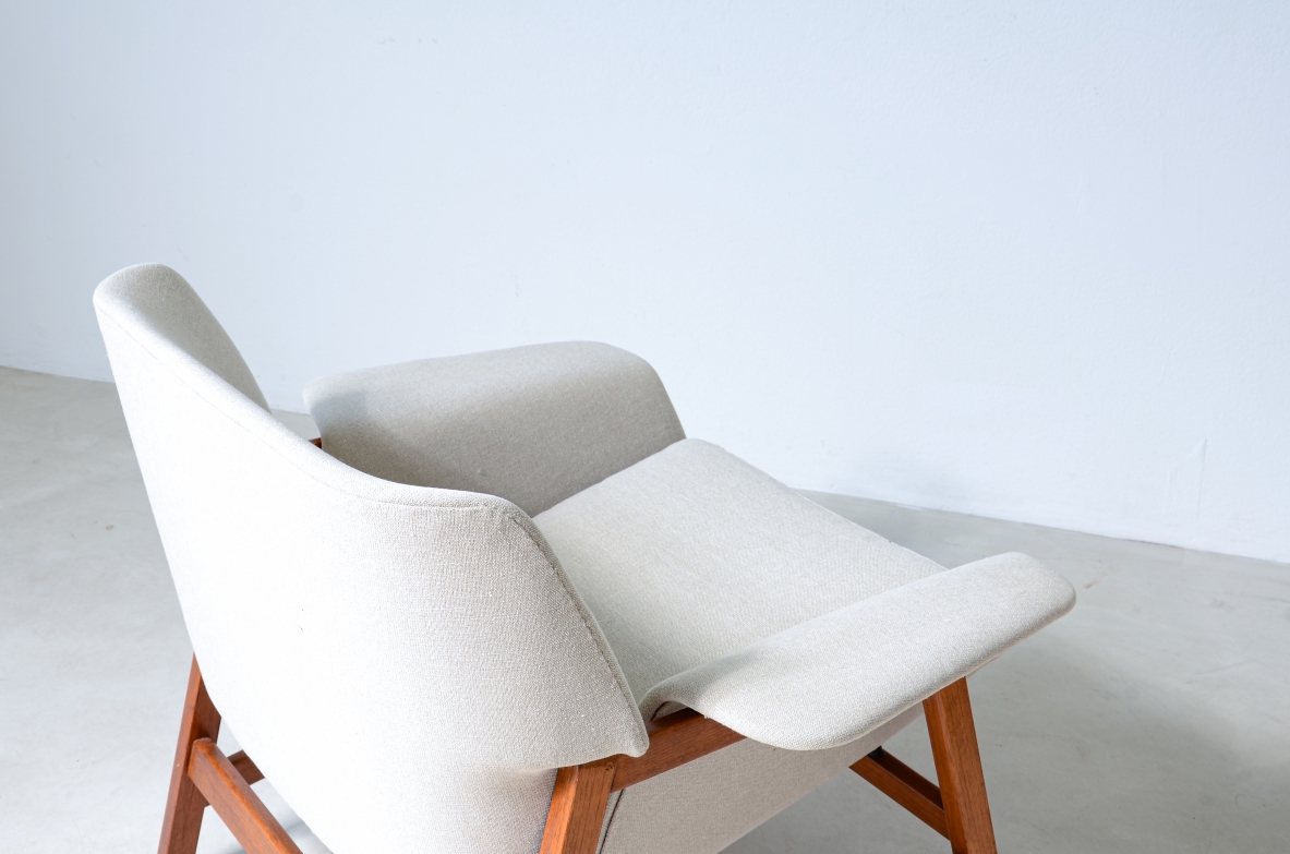 Gianfranco Frattini (1926-2004)  Pair of armchairs model 849 in wood and upholstered fabric.  Cassina production, 1957.