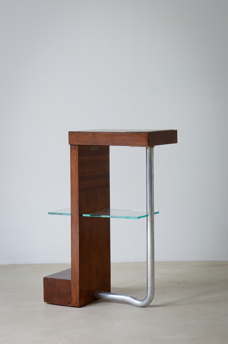 Armando Melis de Villa  Side table in polished wood with curved metal leg.  Designed for the Royal insurance company of Turin.  Italian manufacture, 1930's.