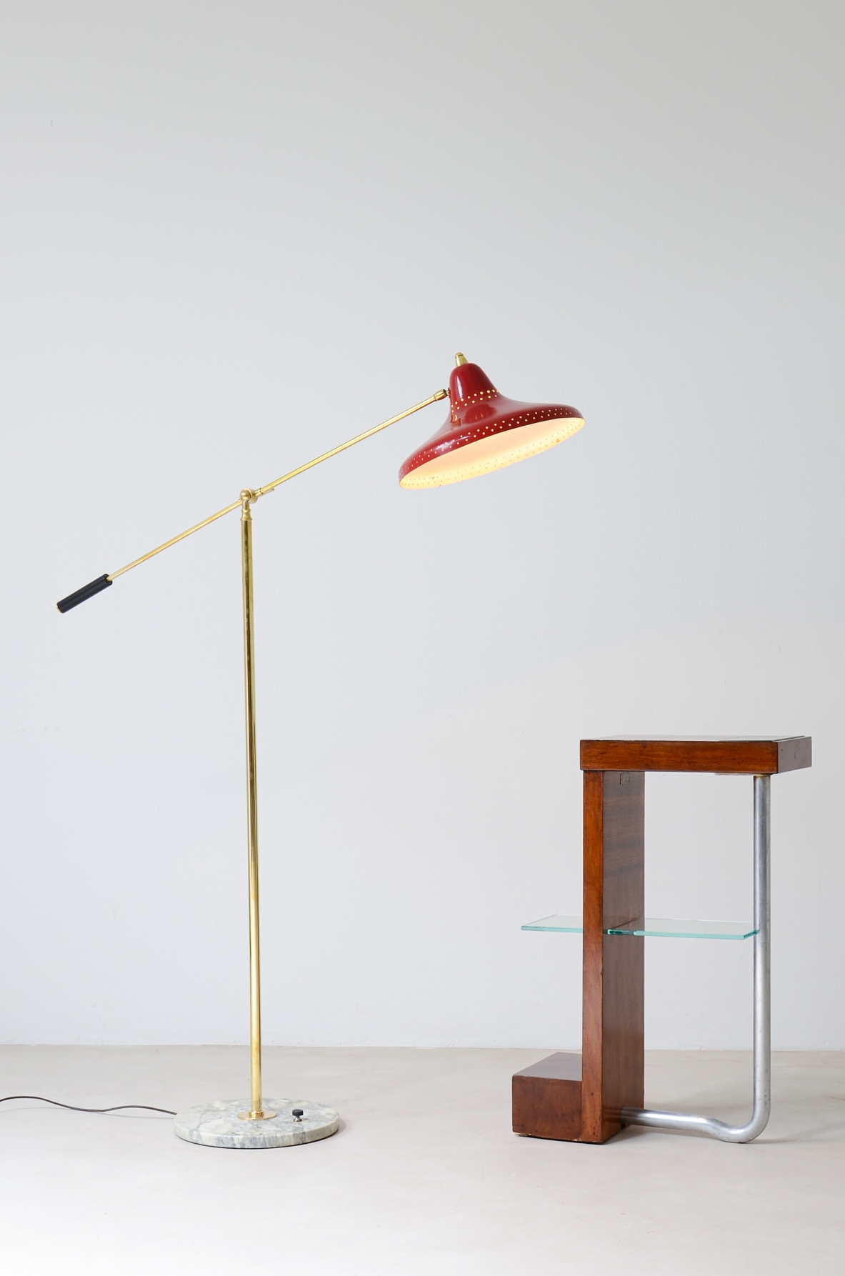 Armando Melis de Villa Side table in polished wood with curved metal