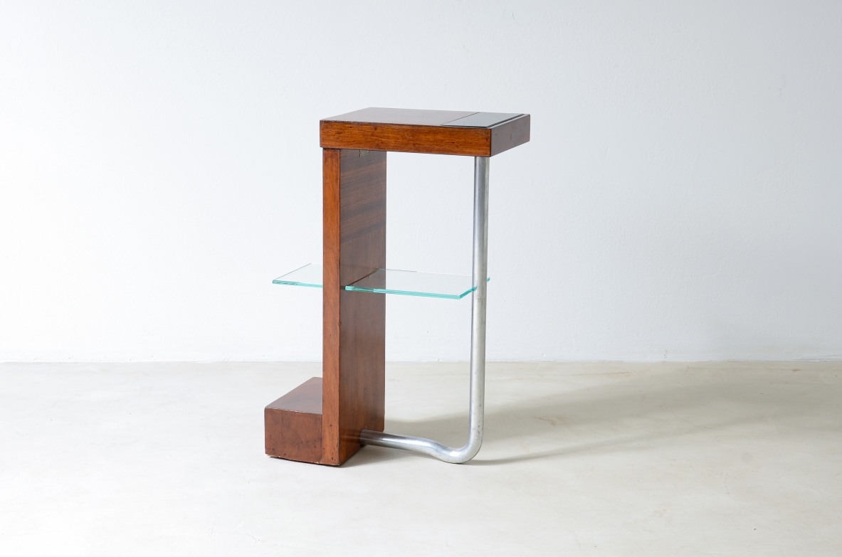 Armando Melis de Villa  Side table in polished wood with curved metal leg.  Designed for the Royal insurance company of Turin.  Italian manufacture, 1930's.