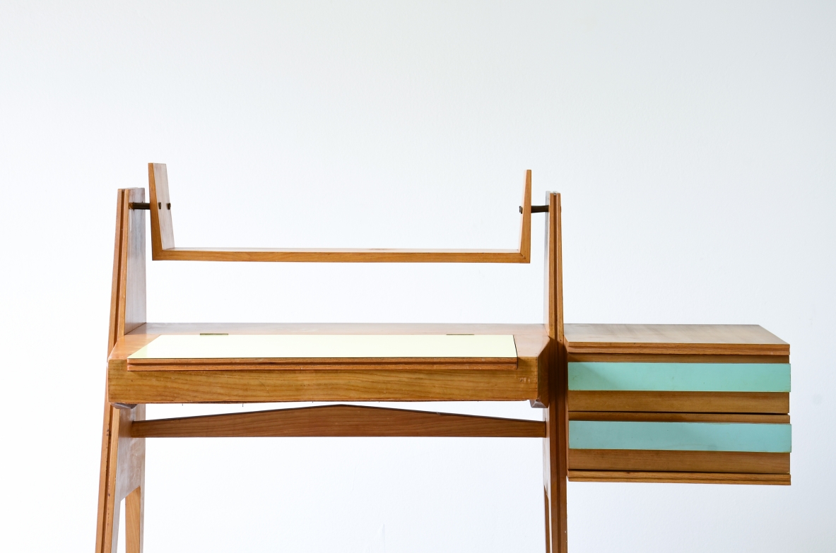 Ico Parisi (1916-1996)  Bedroom writing desk in oak with compartment for objects and shelf. Two drawers on the right side. Top and drawers with original period polypropyleneapplications.  Italian manufacture, 1955. ( to be restored)