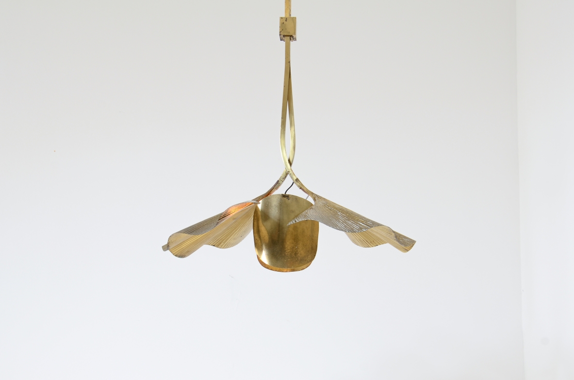 Tommaso Barbi  Large pendant chandelier made by the renowned artist and designer in the shape of a flower composed of 2 large brass ginko leaves and intertwined branches.  Italian manufacture from the 70's
