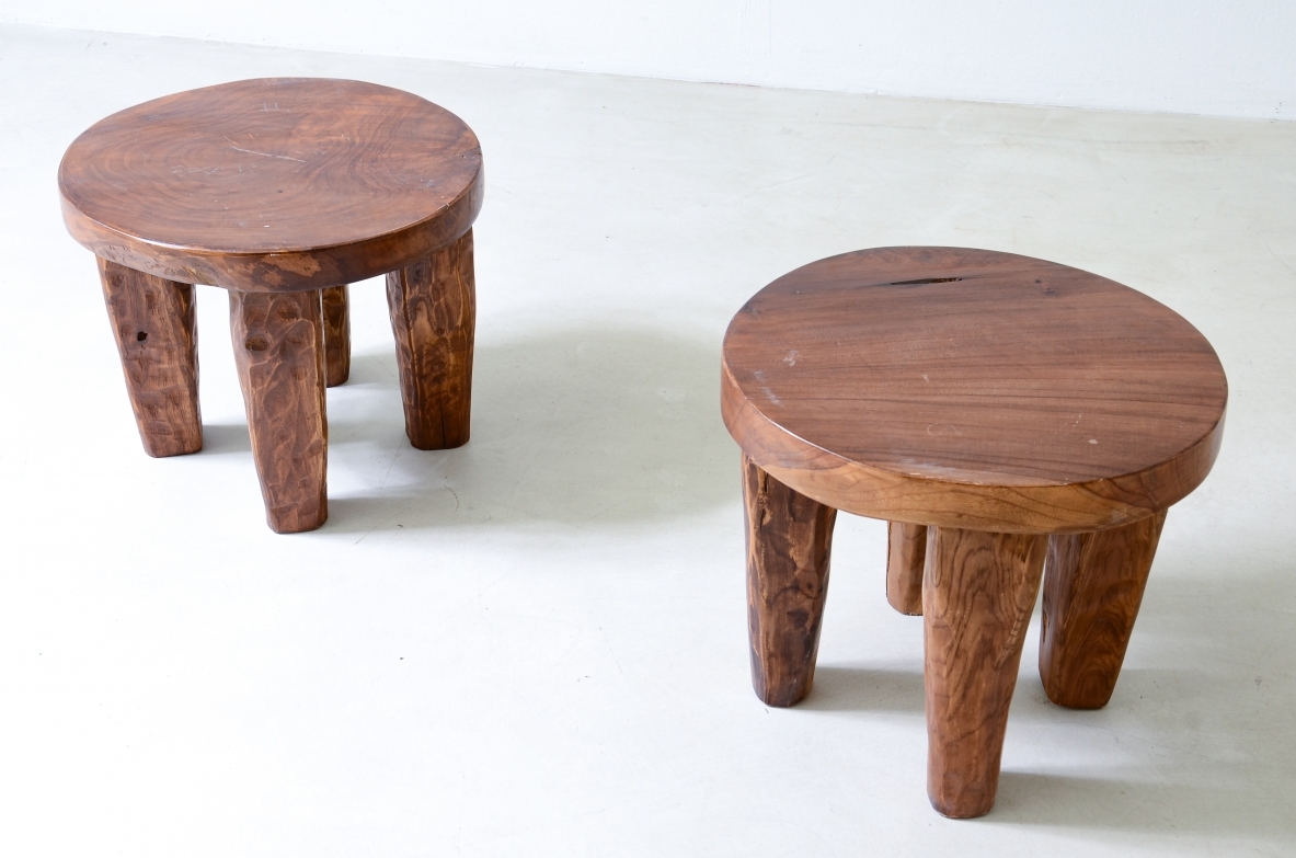 Pair of walnut stools with gouged wooden feet.  Italian manufacture from the 1930s