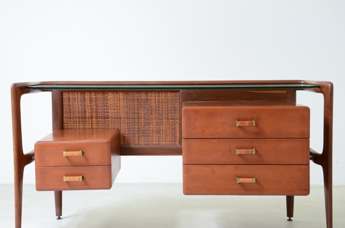 curved wooden console with double row of light wood drawers 1960's manufacturing.