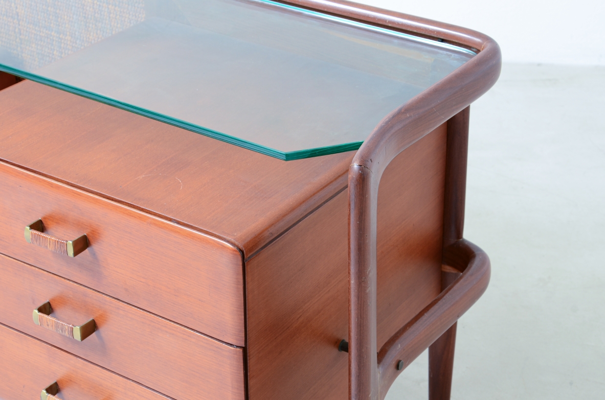 curved wooden console with double row of light wood drawers 1960's manufacturing.