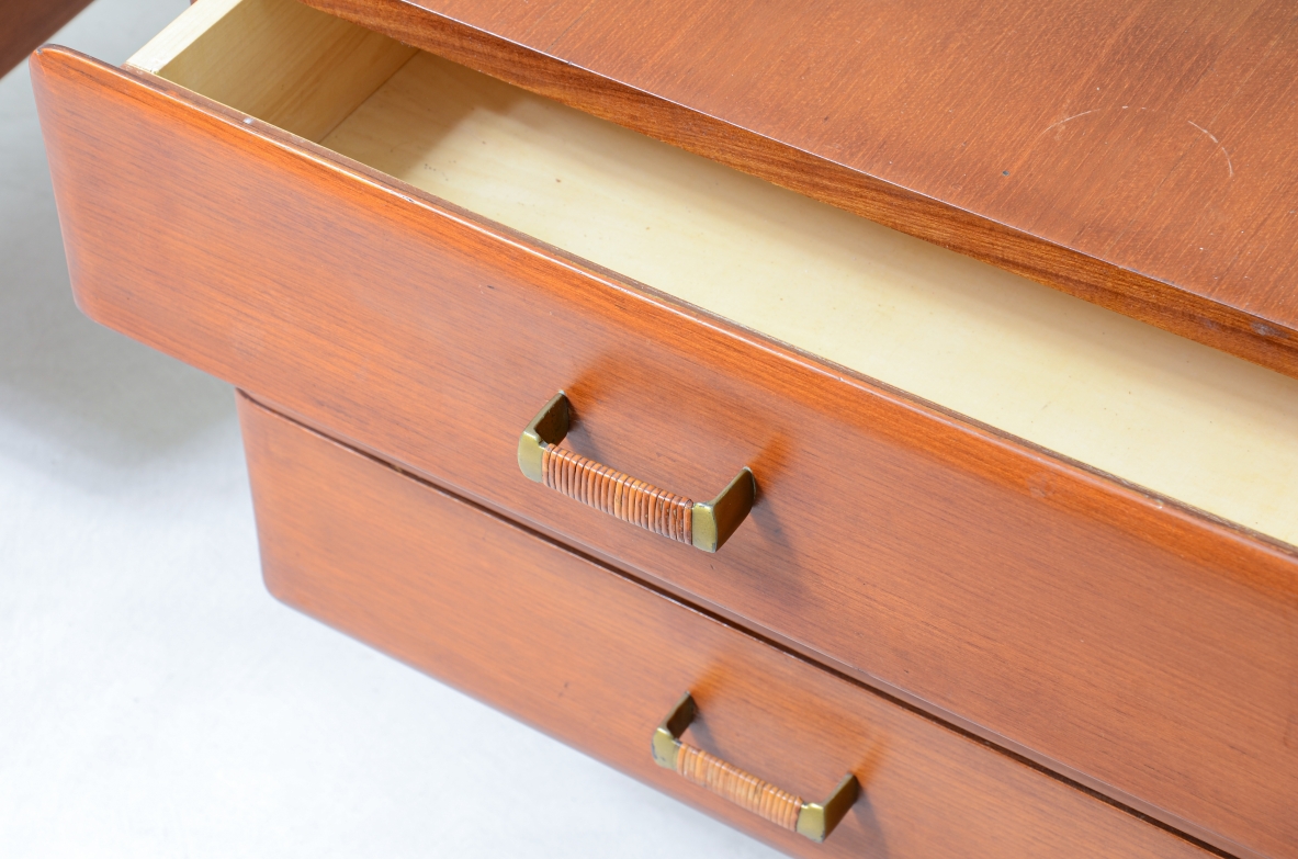 curved wooden console with double row of light wood drawers 1960's manufacturing.