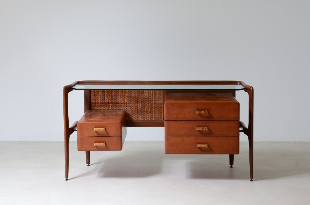 curved wooden console with double row of light wood drawers 1960's manufacturing.