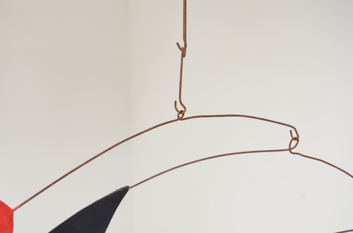Splendid large kinetic sculpture made up of 15 iron and painted plastic board scales.