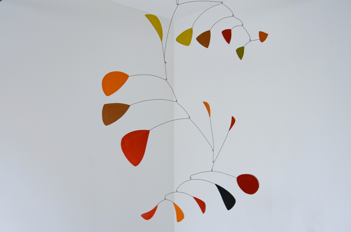 Splendid large kinetic sculpture made up of 15 iron and painted plastic board scales.