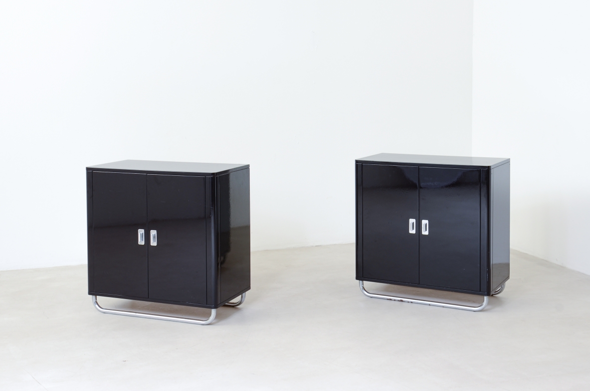 Pair of small storage units in lacquered wood with chromed tubular base . Bauhaus,1930