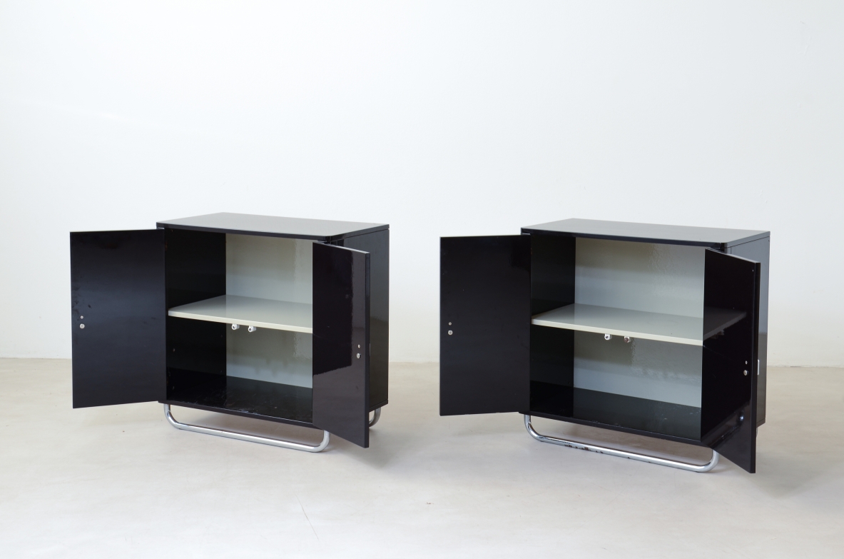 Pair of small storage units in lacquered wood with chromed tubular base . Bauhaus,1930