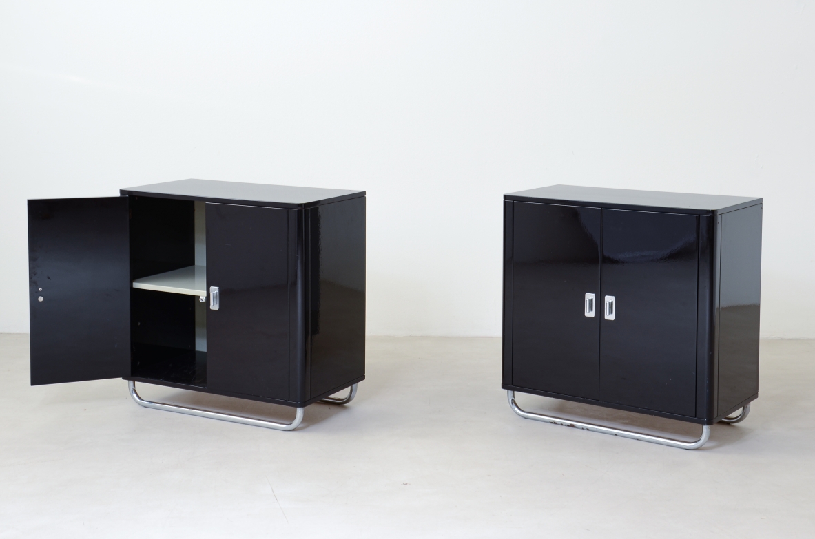 Pair of small storage units in lacquered wood with chromed tubular base . Bauhaus,1930