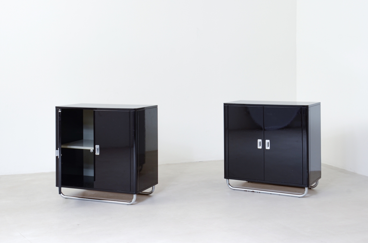 Pair of small storage units in lacquered wood with chromed tubular base . Bauhaus,1930