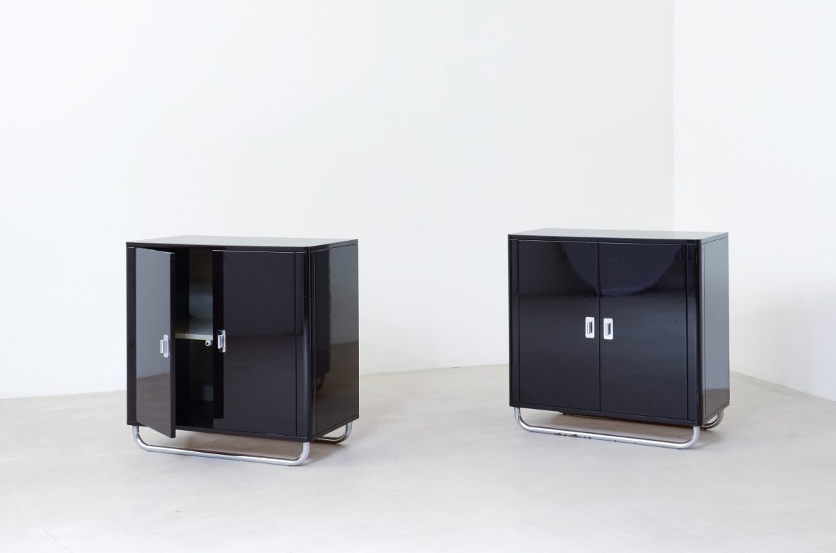 Pair of small storage units in lacquered wood with chromed tubular base . Bauhaus,1930