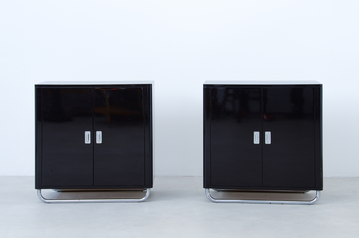 Pair of small storage units in lacquered wood with chromed tubular base . Bauhaus,1930