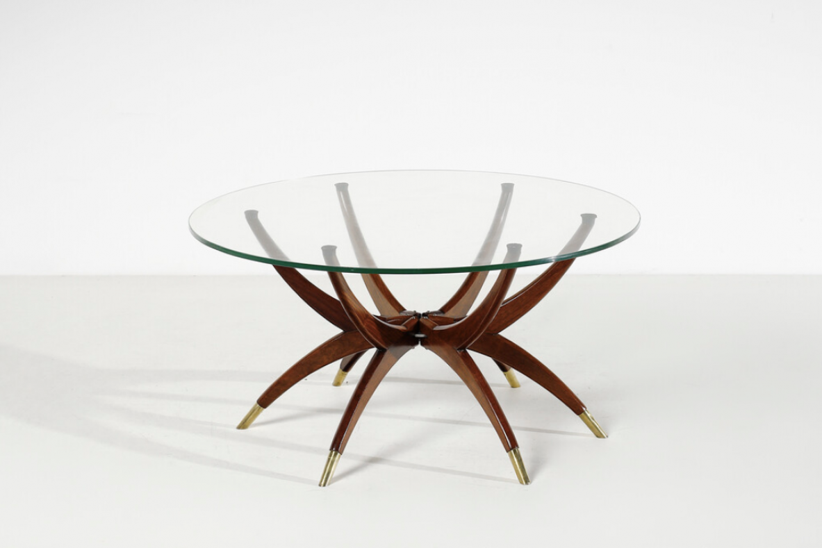 Elegant low table with 6 legs in curved wood with brass tips and cut glass top '50