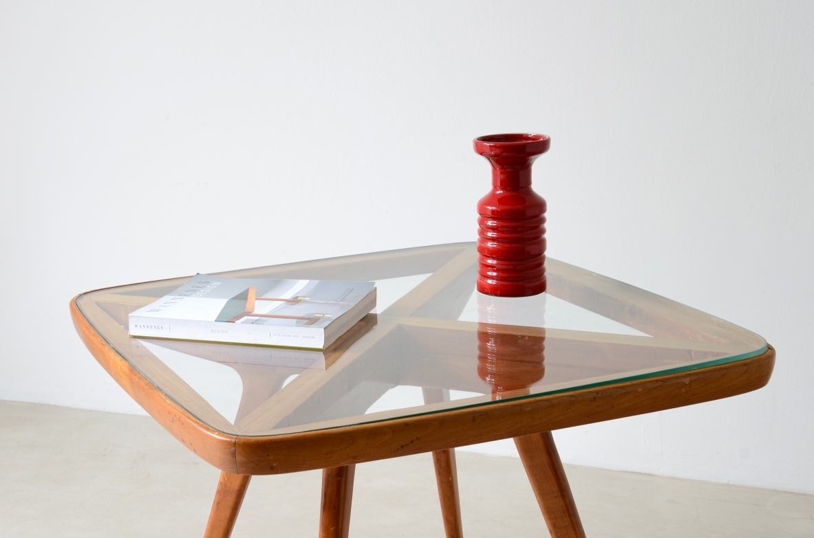 Table with visible cross on the top and legs and elegant thin legs.  Italian manufacture from the 1950s