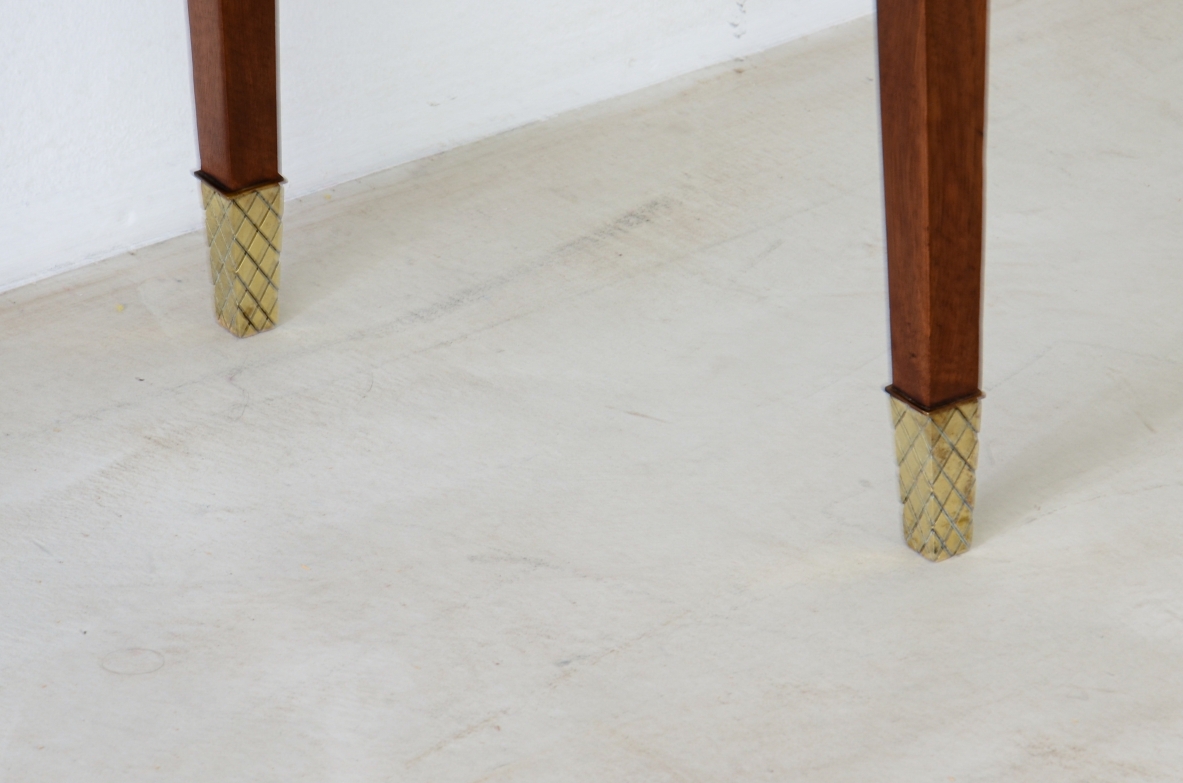 Elegant console moved on the front and sides, drawers and oval travertine top,
