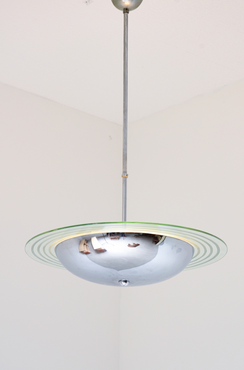 Chromed metal chandelier with cut and engraved crystal disc.  Italian manufacture ca. 1960.