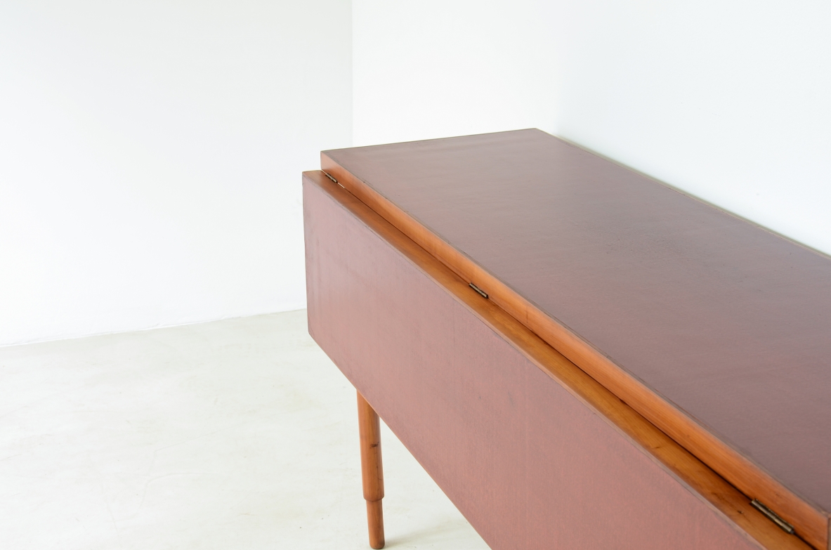 Walnut console/ dining table with red lacquered top. 1960's