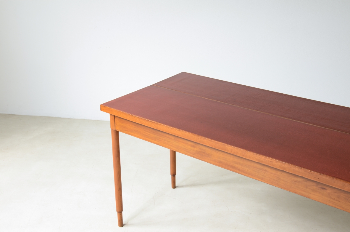 Walnut console/ dining table with red lacquered top. 1960's