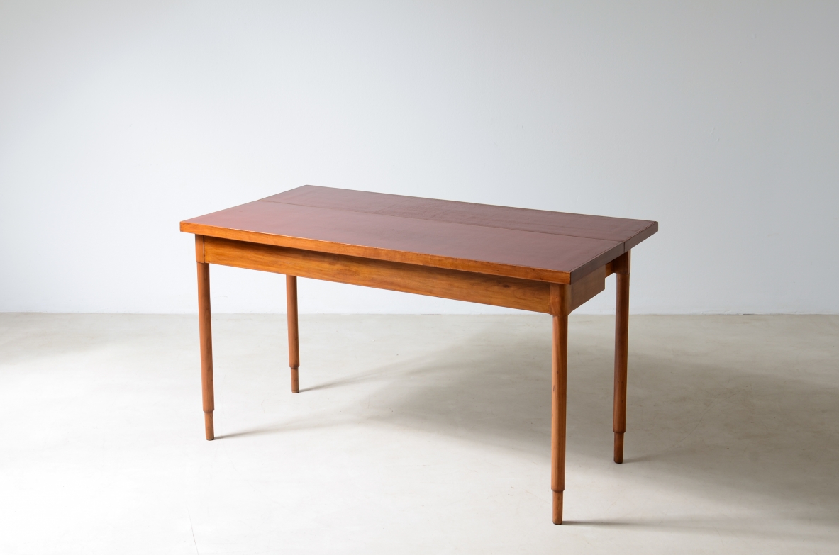 Walnut console/ dining table with red lacquered top. 1960's