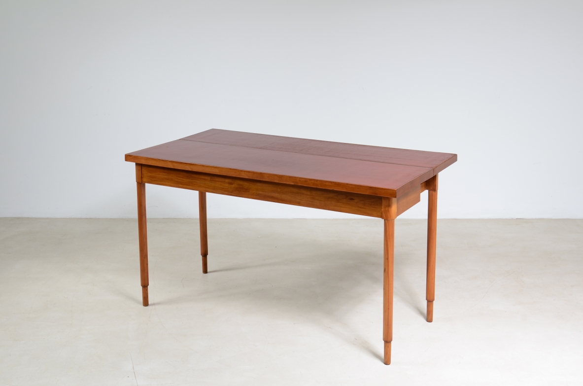 Walnut console/ dining table with red lacquered top. 1960's