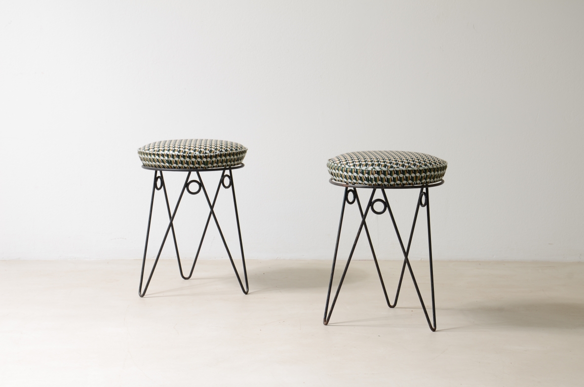 Pair of stools with wrought iron base and fabric seat.  France, 1950ca.