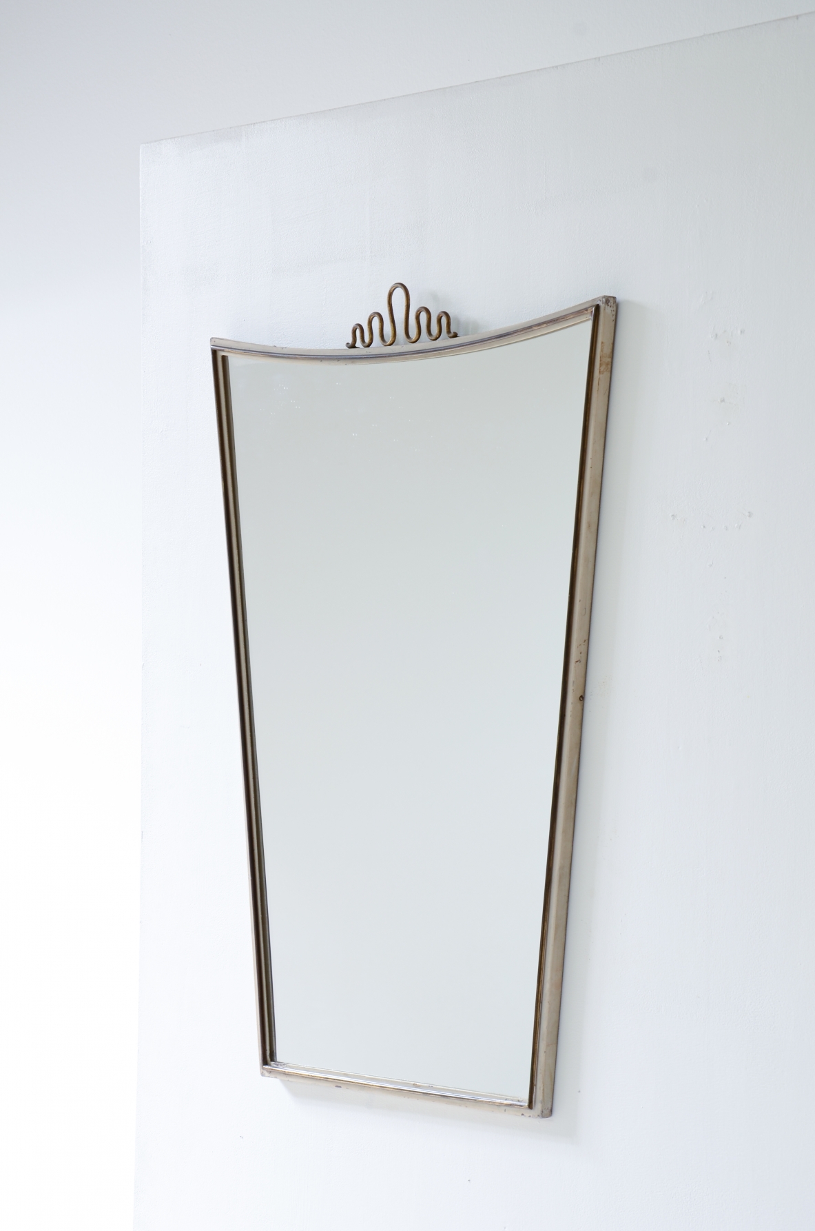 Gio Ponti  Mirror with brass and lacquered metal frame. 1950