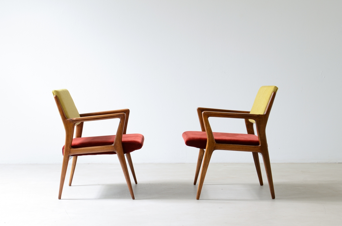Pair of modernist walnut armchairs.  Italian manufacture 1950