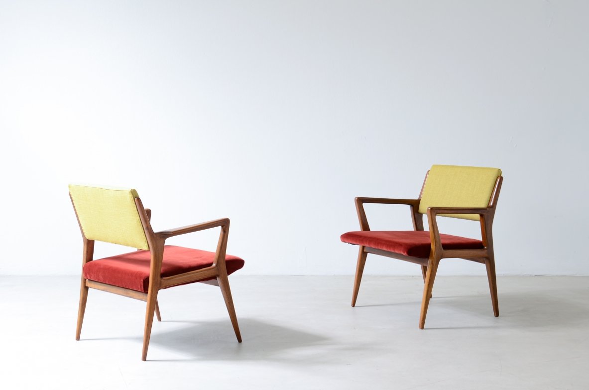 Pair of modernist walnut armchairs.  Italian manufacture 1950