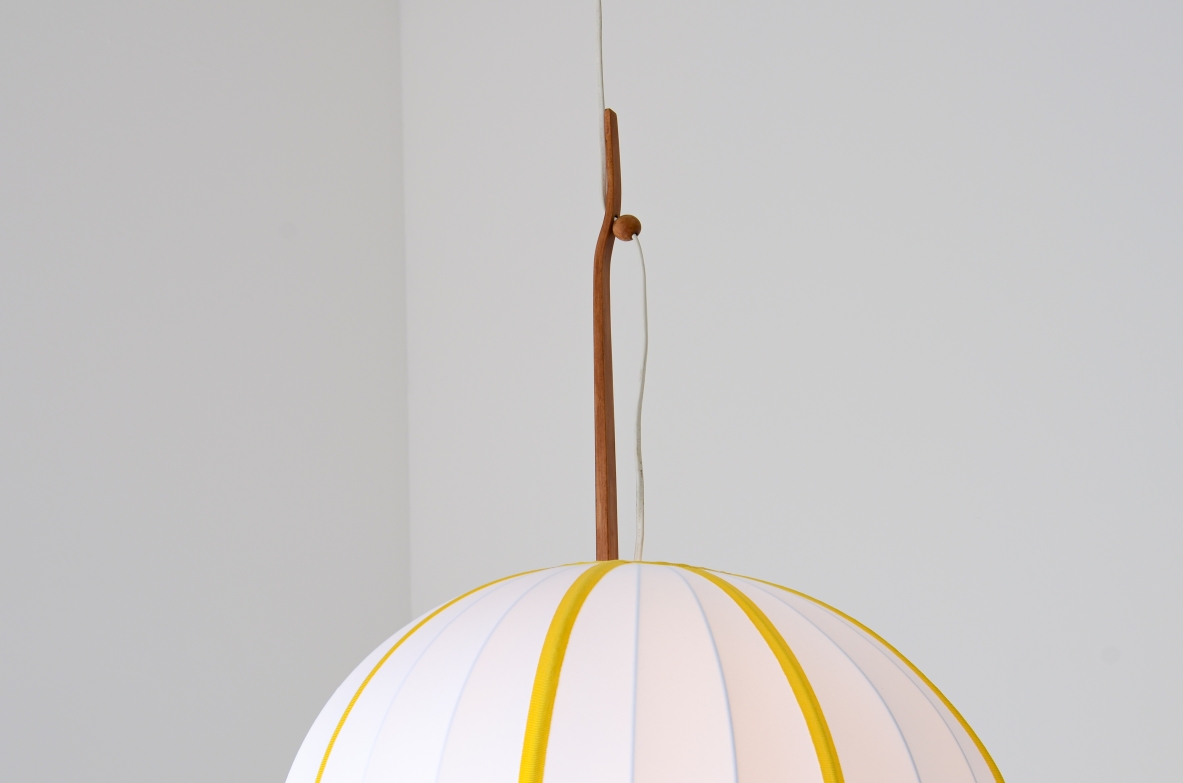 Hans Agne Jacobsson  Large chandelier in striped fabric and shaped teak rod. Manufacture Sweden ca. 1960's