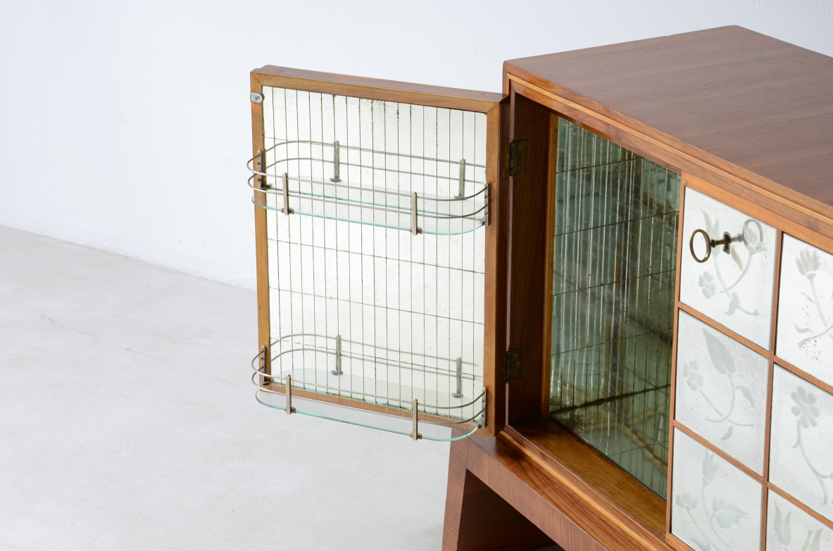 Small wooden bar cabinet with engraved and ground mirror.
