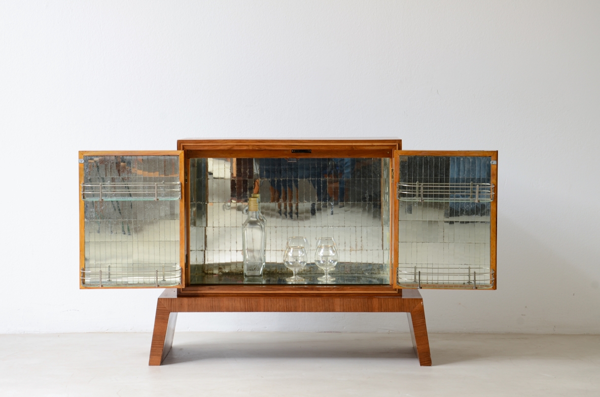 Small wooden bar cabinet with engraved and ground mirror.