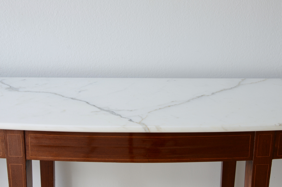 Elegant console with eight tapered legs and Carrara marble top.  Italian manufacture, ca.1950s.