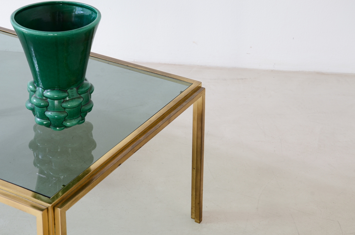 Romeo Rega  Low table in brass and burnished glass.  Manufacturing Rega & Co. Rome, 1970ca.