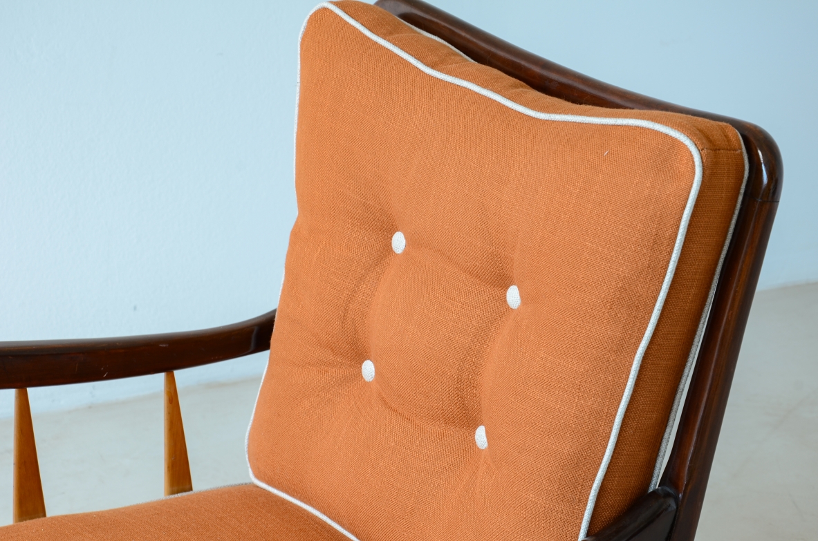 Paolo Buffa  Pair of armchairs in shaped and turned wood with seat and back in padded fabric.1940's