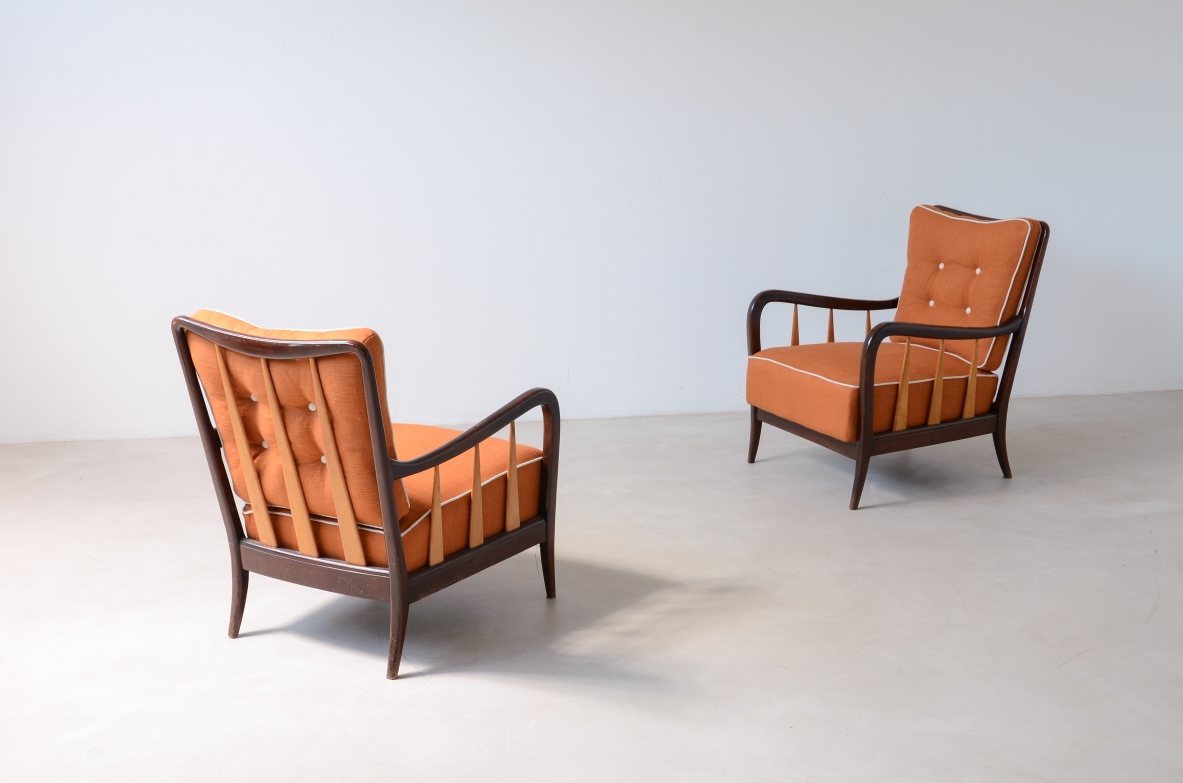Paolo Buffa  Pair of armchairs in shaped and turned wood with seat and back in padded fabric.1940's