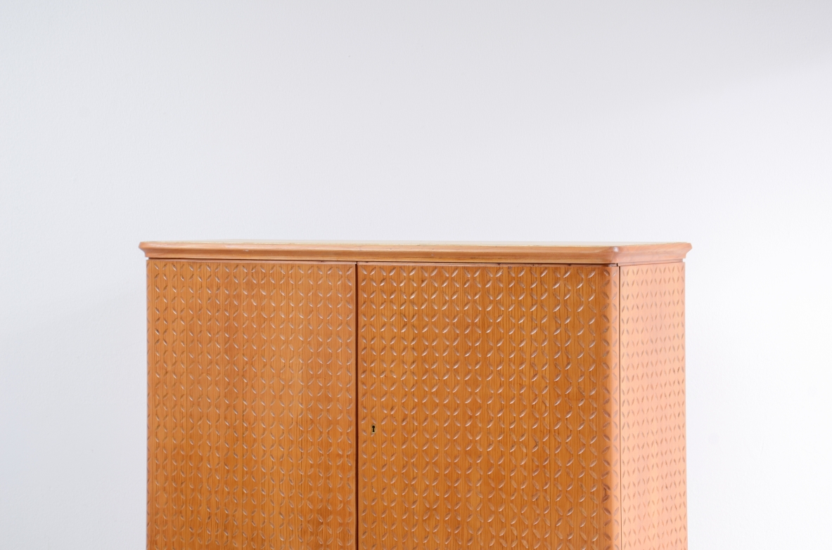 ABV Borsani  Elegant two-door cabinet with carved motifs.1940s.