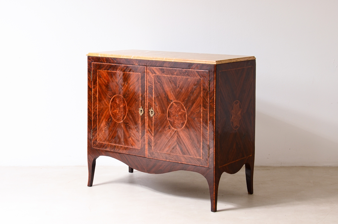 Splendid neoclassical two-door cabinet in veneered wood and inlaid with geometric motifs.Neapolitan cabinetmaking, ca. 1770.