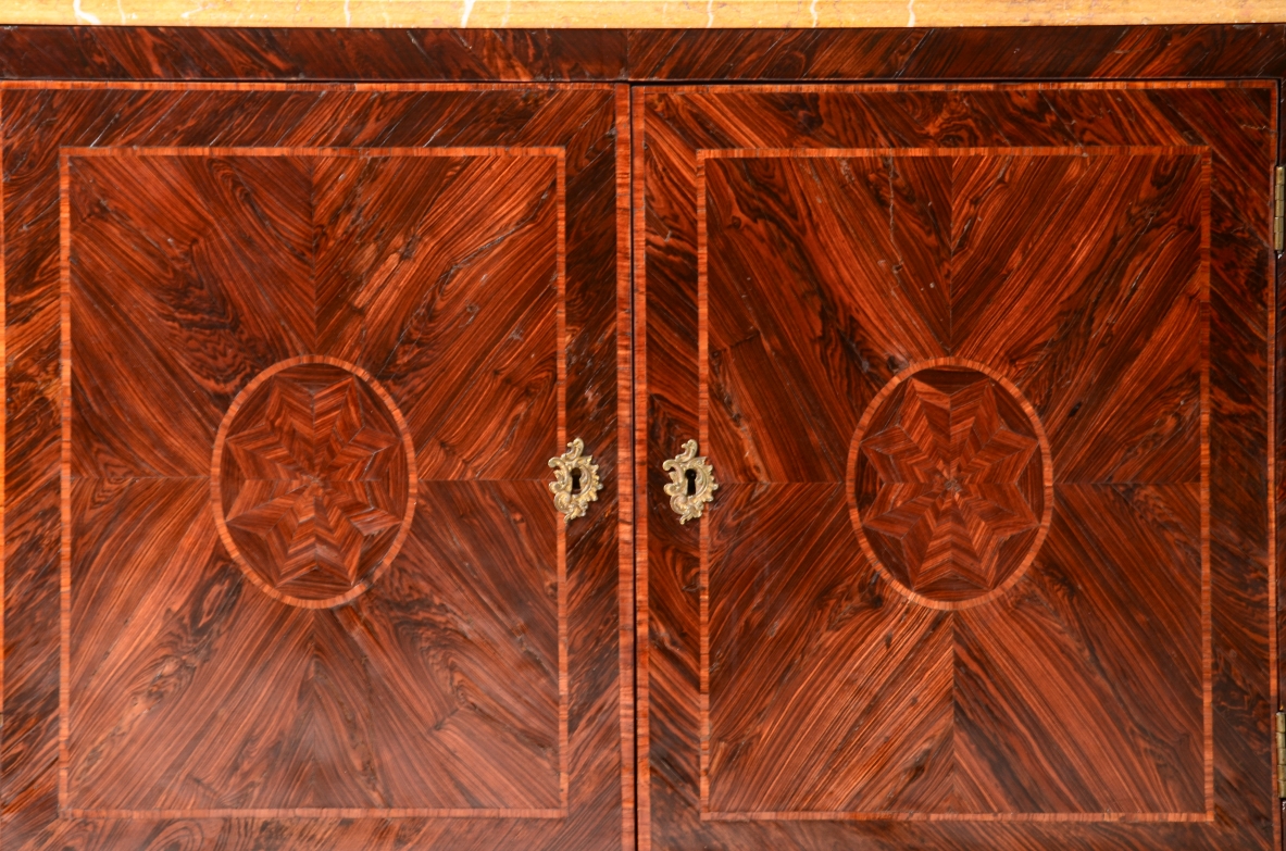 Splendid neoclassical two-door cabinet in veneered wood and inlaid with geometric motifs.Neapolitan cabinetmaking, ca. 1770.