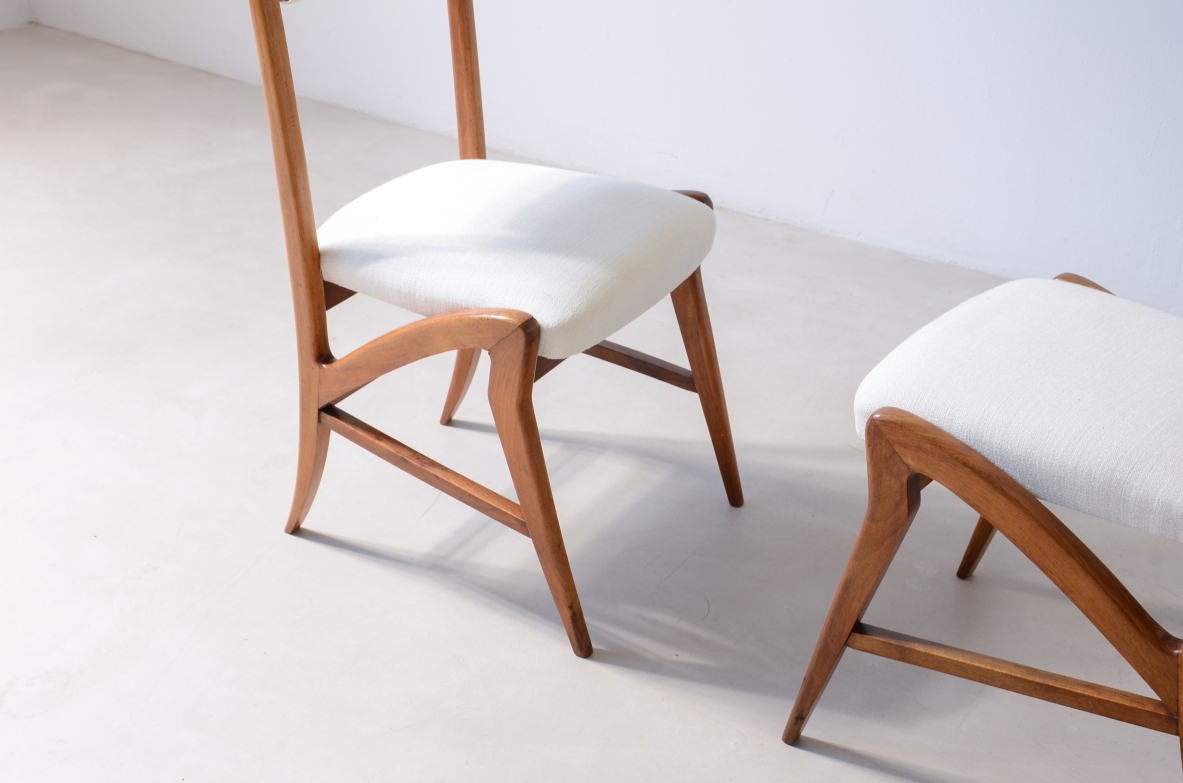 Pair of extraordinary oak chairs with upholstered fabric seat and back.  Attr. Guglielmo Pecorini, ca. 1940.