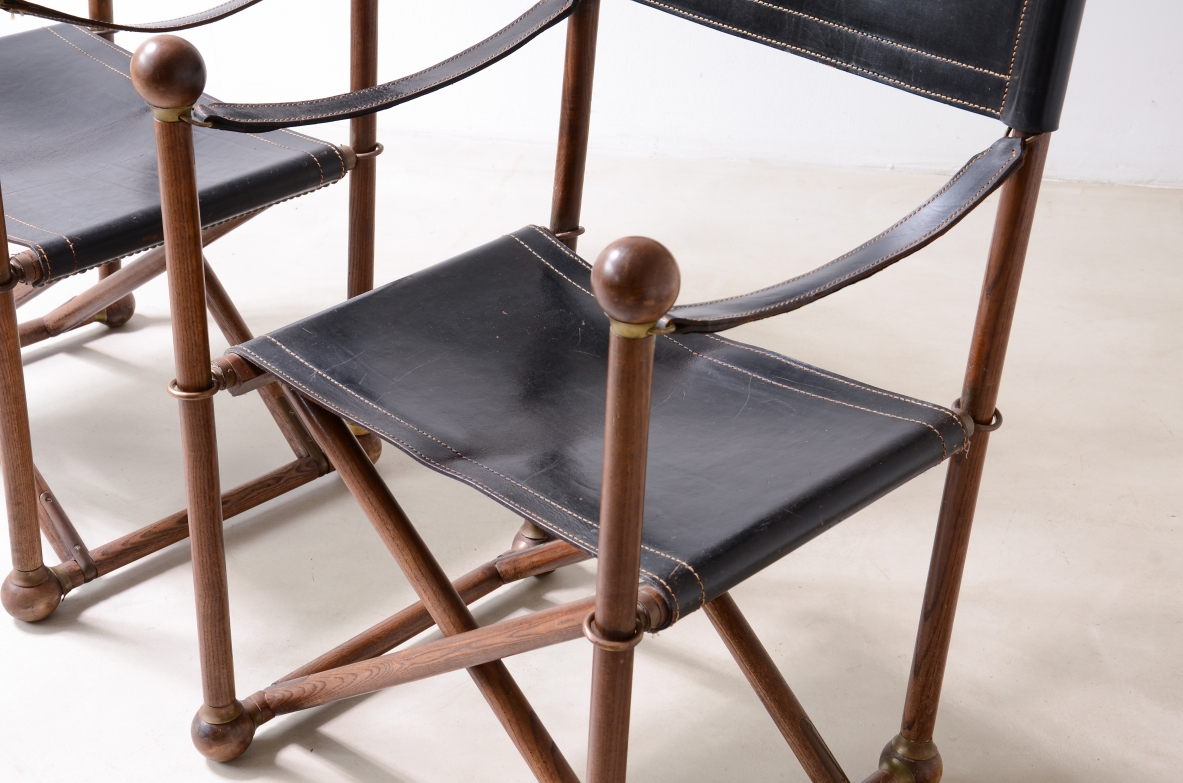 pair of turned wood folding chairs with leather seat, Pierre Lottier for Valenti. Spain 40's